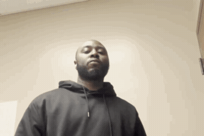 Man In Black Hoodie Standing GIF