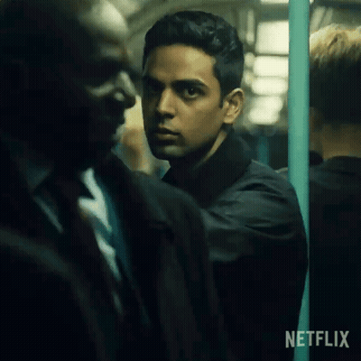 Man In Black Jacket And Another On Subway GIF