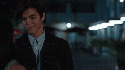 Man In Black Jacket And Blue Shirt With Letter S GIF