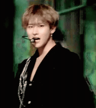 Man In Black Jacket And Earrings GIF