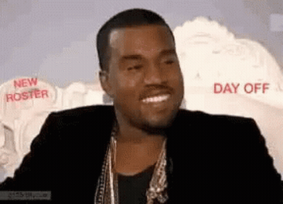 Man In Black Jacket And Gold Chains Smiling Day Off GIF