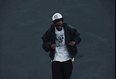 Man In Black Jacket And N.B.G. Hat GIF