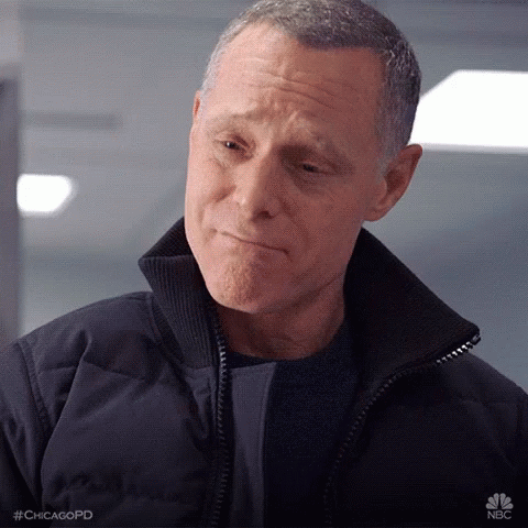 Man In Black Jacket And Sweater Making Funny Face GIF