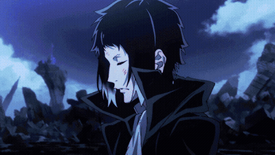 Man In Black Jacket And Tie Before Destroyed Building GIF