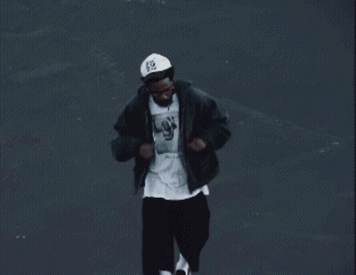 Man In Black Jacket And White E Hat GIF