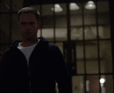 Man In Black Jacket And White Shirt In Front Of Window GIF