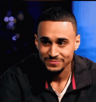 Man In Black Jacket And White Shirt Smiling GIF