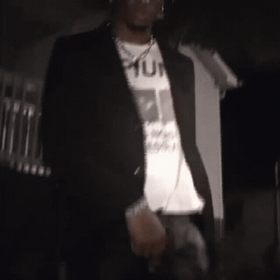 Man In Black Jacket And White T-Shirt Saying Punk GIF