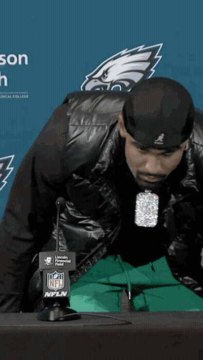 Man In Black Jacket At NFL Logo Microphone GIF