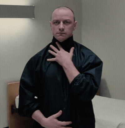 Man In Black Jacket Hand On Chest GIF