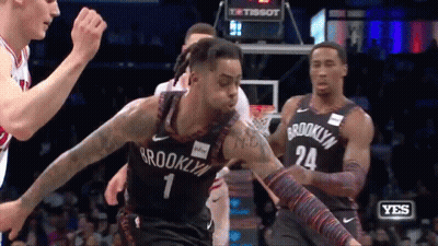 Man In Black Jacket Holding Basketball Thumbs Up GIF