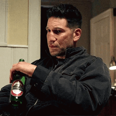 Man In Black Jacket Holding Benjamin Beer GIF