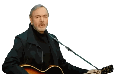 Man In Black Jacket Holding Guitar With A On Neck Sticker