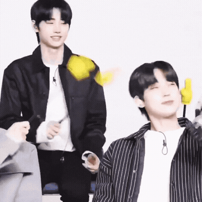 Man In Black Jacket Holding Yellow Object, Watcher GIF