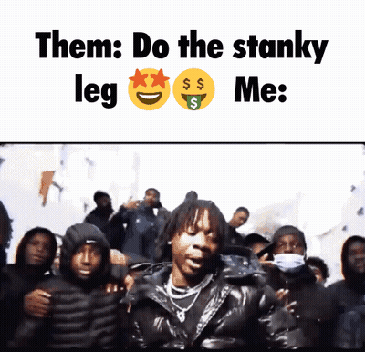 Man In Black Jacket In Front Of Crowd Saying Them Do The Stanky Leg Me GIF