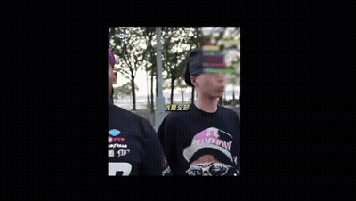 Man In Black Jacket In Front Of Trees GIF
