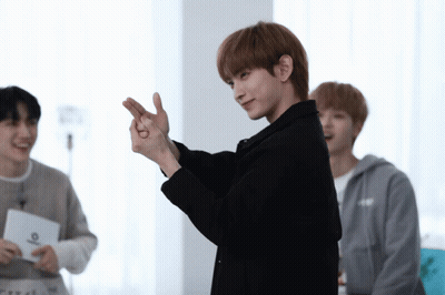 Man In Black Jacket Making Heart With Fingers GIF