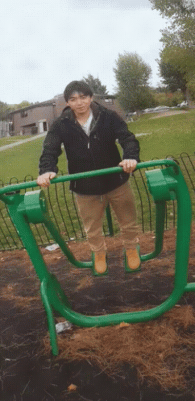 Man In Black Jacket On Green Machine GIF