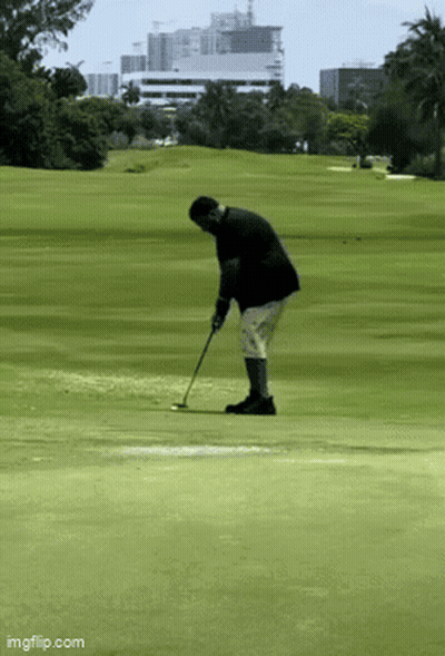 Man In Black Jacket Playing Golf GIF
