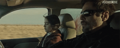Man In Black Jacket Pointing Gun GIF