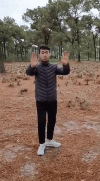 Man In Black Jacket Raising Hands GIF