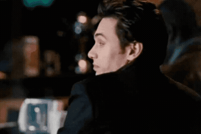 Man In Black Jacket Saying Hey Trouble GIF