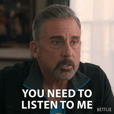Man In Black Jacket Saying Listen GIF