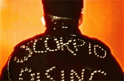 Man In Black Jacket Saying Scorpion GIF