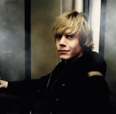 Man In Black Jacket Standing In Elevator GIF