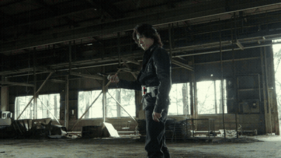 Man In Black Jacket Standing In Empty Room GIF