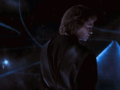 Man In Black Jacket Standing In Front Of Blue Object GIF