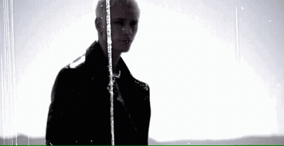Man In Black Jacket Standing In Rain GIF
