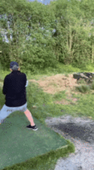 Man In Black Jacket Throwing Frisbee GIF