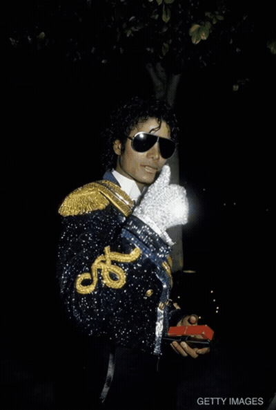 Man In Black Jacket White Glove Peace Sign GIF