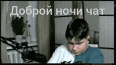 Man In Black Jacket With 'A' Pin GIF