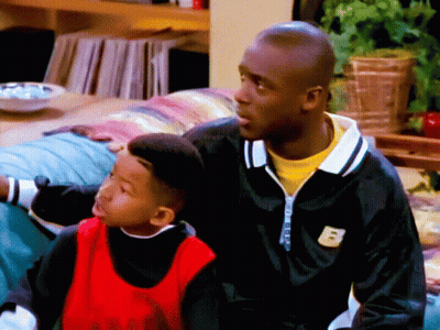 Man In Black Jacket With B Beside Boy GIF