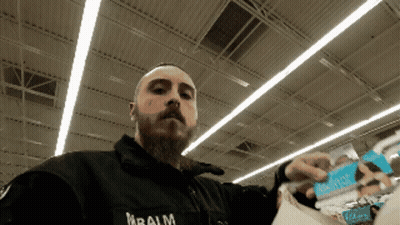 Man In Black Jacket With Balm Text GIF