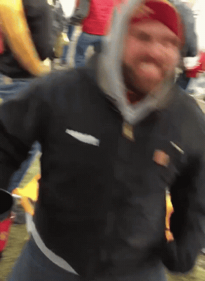Man In Black Jacket With Columbia On Back GIF