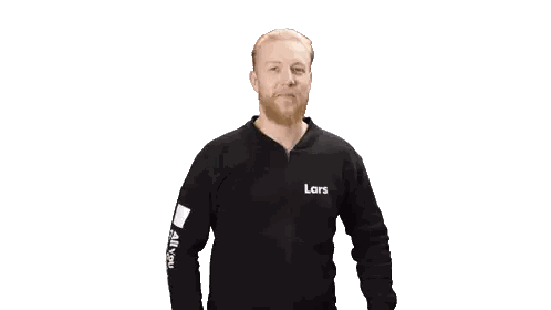 Man In Black Jacket With Lars Sticker