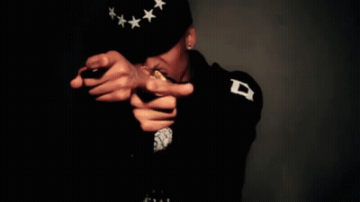 Man In Black Jacket With LK On Sleeves GIF