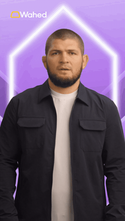 Man In Black Jacket With Wahed On Purple Background GIF