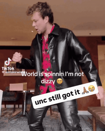 Man In Black Leather Jacket Dancing World Is Spinnin I'm Not Dizzy GIF