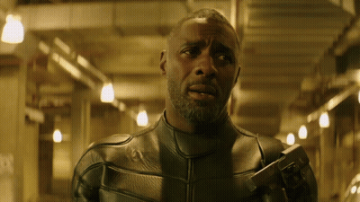 Man In Black Leather Jacket Holding Gun GIF