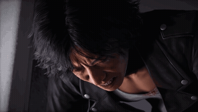 Man In Black Leather Jacket Looking Down GIF