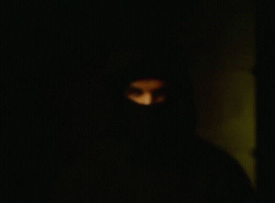Man In Black Mask Close Up GIF