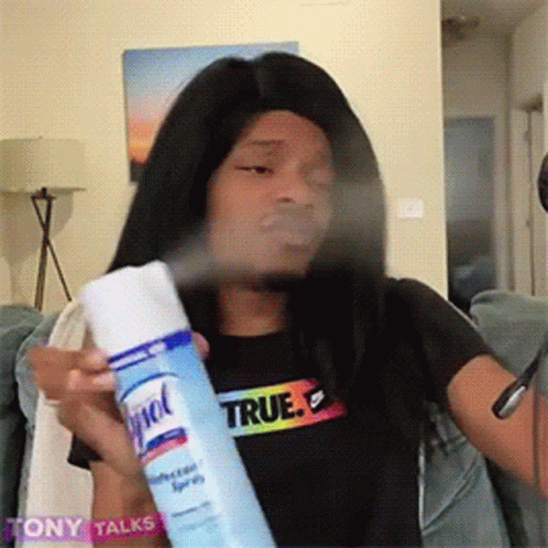 Man In Black Mask Holding Air Freshener GIF