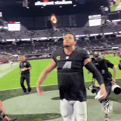 Man In Black NFL Jersey On Field GIF