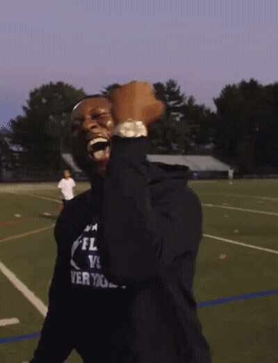 Man In Black NFL Shirt Fist Pump GIF