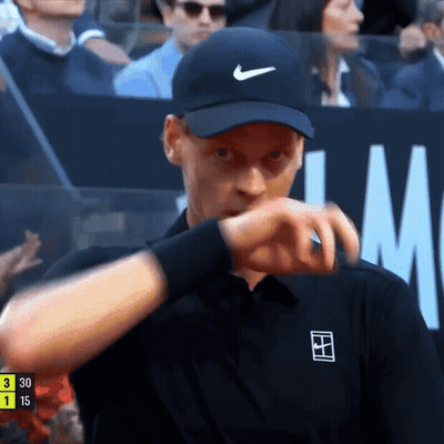 Man In Black Nike Hat Checking Watch GIF