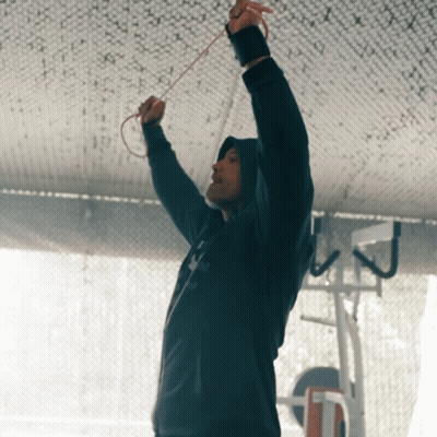 Man In Black Nike Hoodie Holding Rope GIF